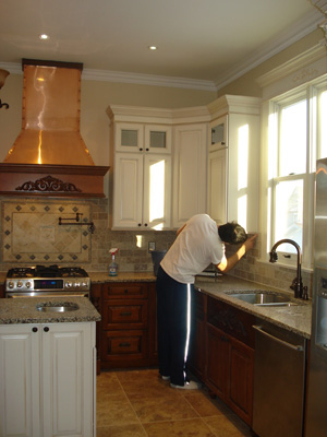 Finishing touches on the kitchen tile