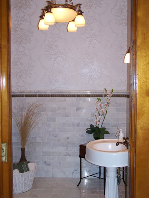 Marble tile and pedestal sink